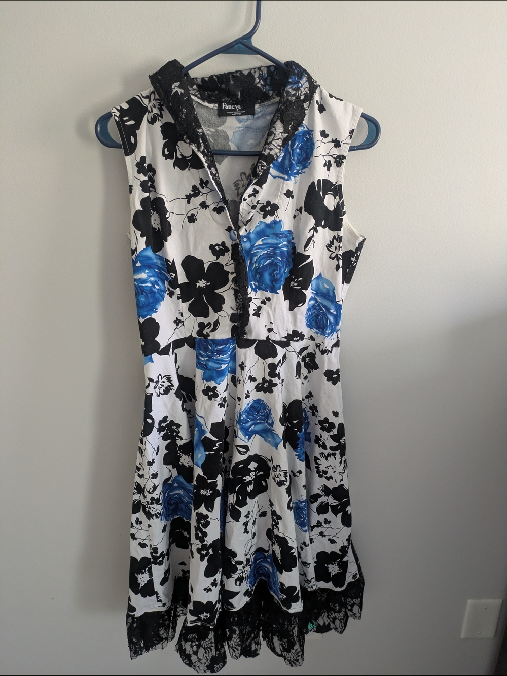 Sleeveless White Dress with Blue & Black Floral Print